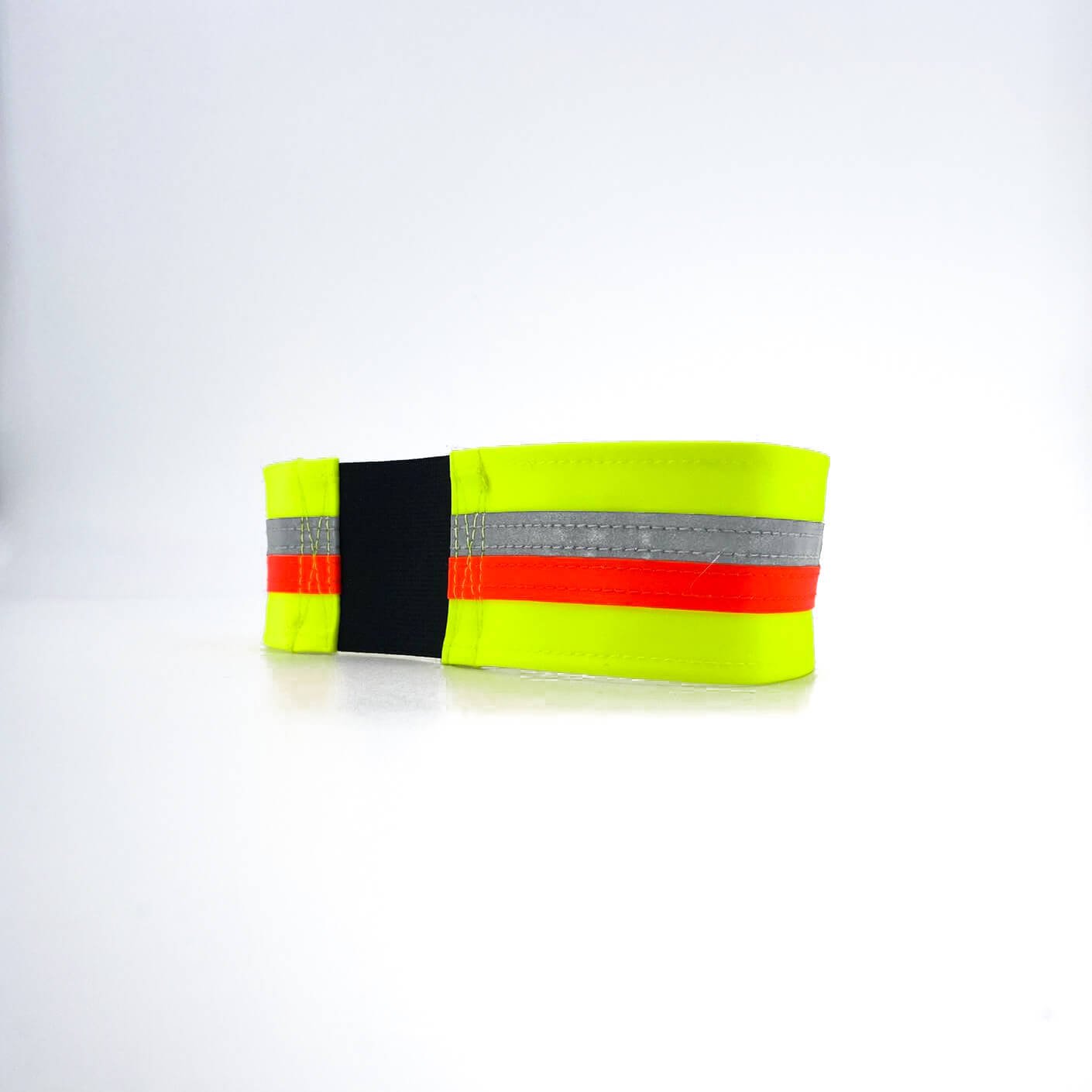 Hundehalsband in Neongelb mit einem Sreifen in Orange, einem reflektierenden Streifen und einem elastischen Gummieinsatz